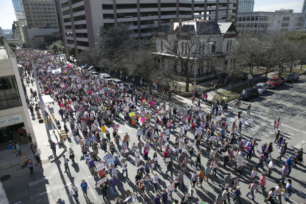 People attend the Women's March on Austin, joining other movements across the country to stand up for women's rights, Saturday, Jan. 21, 2017, in Austin, Texas. In a global exclamation of defiance and solidarity, more than 1 million people rallied at women's marches in the nation's capital and cities around the world Saturday to send President Donald Trump an emphatic message on his first full day in office that they won't let his agenda go unchallenged. (Ralph Barrera/Austin American-Statesman via AP) NYTCREDIT: Ralph Barrera/Austin American-Statesman, via Associated Press