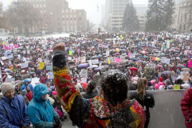 Tai Simpson from the Nez Perce Tribe in Lapwai, Idaho unites as supporters gather at the steps if the Idaho Statehouse for the Women's March on Idaho in Boise, Saturday Jan. 21, 2017. The march is being held in solidarity with similar events taking place in Washington and around the nation. (Darin Oswald/Idaho Statesman via AP) NYTCREDIT: Darin Oswald/Idaho Statesman, via Associated Press