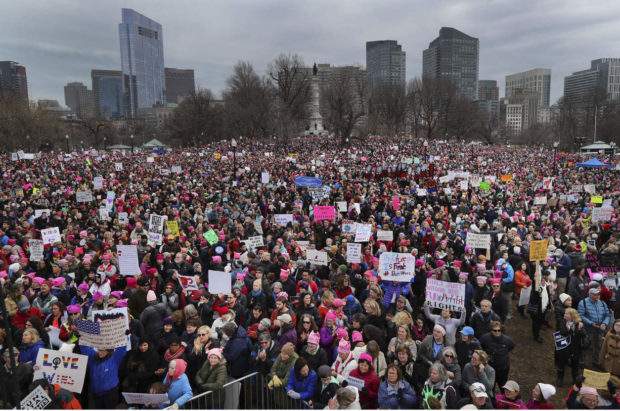 Thousands of people fill Boston Common during a Women's March Saturday Jan. 21, 2017 in Boston. The march is being held in solidarity with similar events taking place in Washington and around the nation. ( John Tlumacki/The Boston Globe via AP) NYTCREDIT: Johntlumacki/The Boston Globe, via Associated Press
