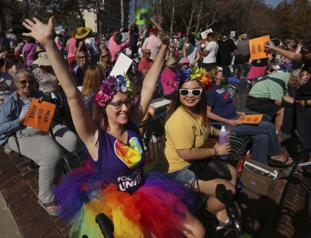 Danielle Ziss, left, cheers during a Central Florida Women's Rally at Lake Eola Park on Saturday, Jan. 21, 2017. (Stephen M. Dowell/Orlando Sentinel via AP) NYTCREDIT: Stephen M. Dowell/Orlando Sentinel, via Associated Press