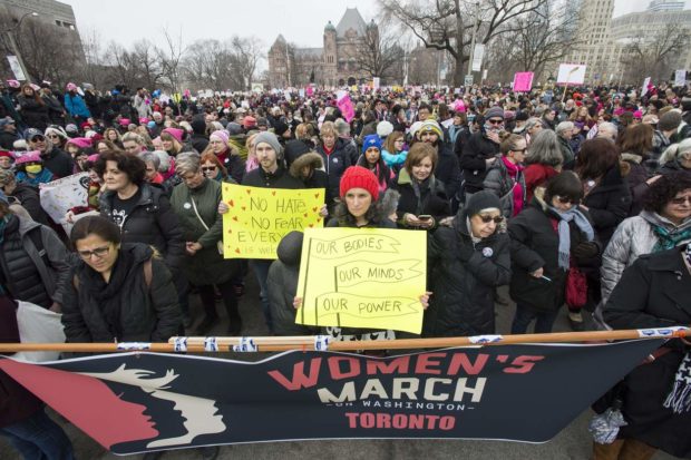 Protesters march in support of the Women's March on Washington in Toronto on Saturday, January 21, 2017. Organizers say 30 events in all have been organized across Canada, including Ottawa, Toronto, Montreal and Vancouver. (Frank Gunn/The Canadian Press via AP) NYTCREDIT: Frank Gunn/The Canadian Press, via Associated Press