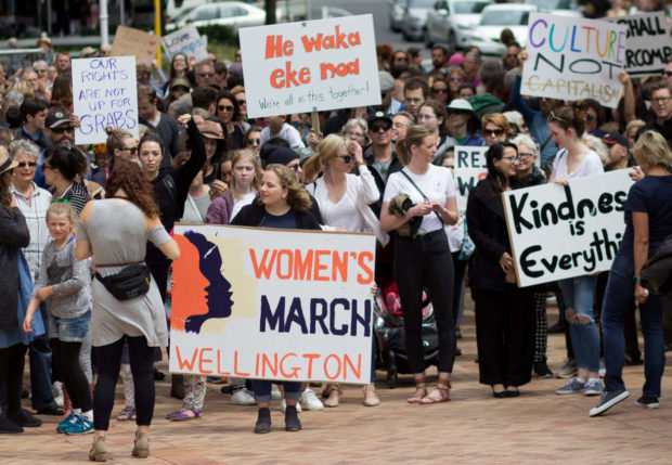 Participants of a rally regarding women's rights hold placards as they march in Wellington, New Zealand, January 21, 2017 the day after Donald Trump's inauguration as President of the United States. Joshua Gimblett/Handout via REUTERS ATTENTION EDITORS - THIS IMAGE WAS PROVIDED BY A THIRD PARTY. EDITORIAL USE ONLY. NO RESALES. NO ARCHIVE. NYTCREDIT: Reuters