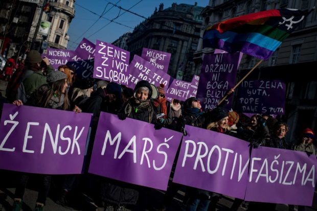 People hold a banner which translates as "Womens march against fascism" during a rally in solidarity with the Women's March taking place in Washington and many other cities on January 21, 2017 in Belgrade, one day after the inauguration of the US President. Protest rallies were held in over 30 countries around the world in solidarity with the Washington Women's March in defense of press freedom, women's and human rights following the official inauguration of Donald J Trump as the 45th President of the United States of America. / AFP PHOTO / ANDREJ ISAKOVICANDREJ ISAKOVIC/AFP/Getty Images NYTCREDIT: Andrej Isakovic/Agence France-Presse -- Getty Images
