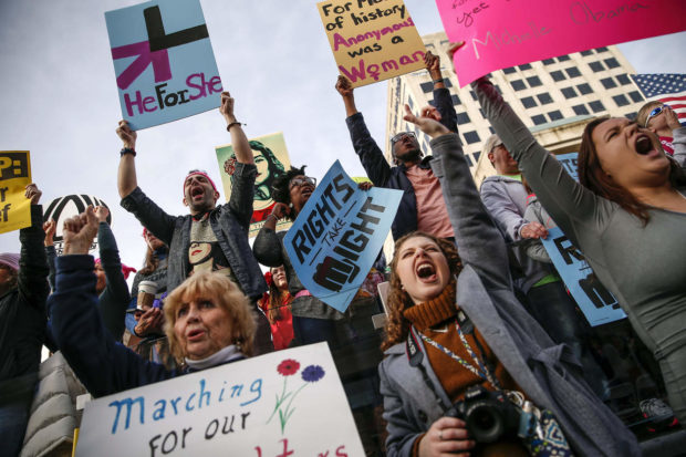 Thousands attend the Women's March Indianapolis rally, a sister rally of the Women's March on Washington, on the west side of the Indiana Statehouse in Indianapolis on Saturday, Jan. 21, 2017. ( Mykal McEldowney/The Indianapolis Star via AP) NYTCREDIT: Mykal Mceldowney/The Indianapolis Star, via Associated Press