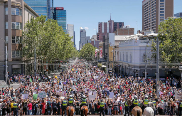 MELBOURNE, AUSTRALIA - JANUARY 21: Protesters take part in the Melbourne rally to protest against the Trump Inauguration on January 21, 2017 in Melbourne, Australia. The marches in Australia were organised to show solidarity with those marching on Washington DC and around the world in defense of women's rights and human rights. (Photo by Wayne Taylor/Getty Images) NYTCREDIT: Wayne Taylor/Getty Images