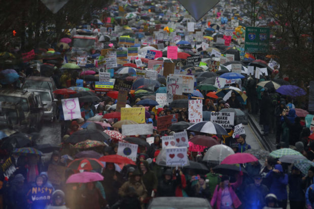 People gathered in Portland's Tom McCall Waterfront Park and marched through downtown, Portland, Ore., Jan. 21, 2017, in local support for the Women's March on Washington following the election of Donald Trump. (Beth Nakamura/The Oregonian via AP) NYTCREDIT: Beth Nakamura/The Oregonian, via Associated Press