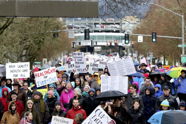 Thousands rally during the Salem Women's March, a Washington, D.C. sister march, beginning at the Oregon State Capitol in Salem on Saturday, Jan. 21, 2017. (Anna Reed/Statesman-Journal via AP) NYTCREDIT: Anna Reed/Statesman-Journal, via Associated Press
