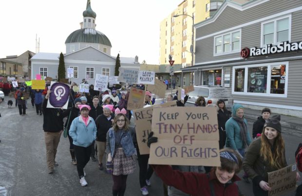 Hundreds of people march in downtown Sitka, Alaska, during the women's march, held in solidarity with the Women's March on Washington, Saturday, Jan. 21, 2017. (James Poulson/The Daily Sitka Sentinel via AP) NYTCREDIT: James Poulson/The Daily Sitka Sentinel, via Associated Press